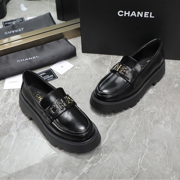 CHANEL Black Leather Loafers with Gold Accents - Picture 3 of 9